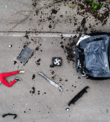 young-injured-woman-lying-on-the-road-after-a-car-2025-10-11-11-38-50-utc